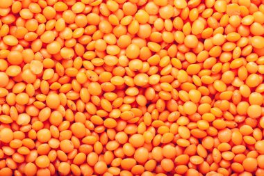 Kırmızı mercimek arka planı. Soyut gıda dokusu.