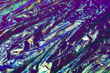 Holografik soyut neon dokulu arkaplan.