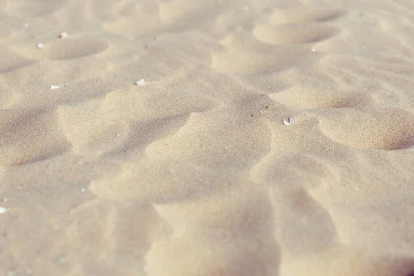 Texture di sabbia. Spiaggia di sabbia come sfondo. — Foto Stock