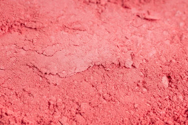 Close up of smashed coral eyeshadow as a background. — ストック写真