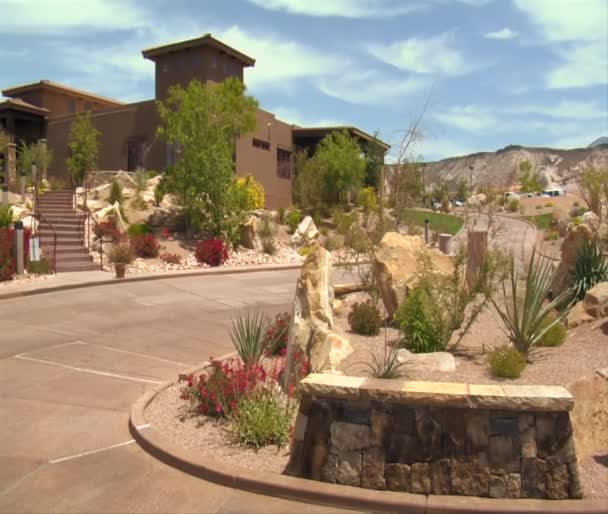 Golf cart passes camera on the way to the clubhouse — Stock Video