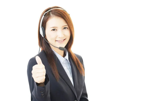 Operador de call center sorridente — Fotografia de Stock