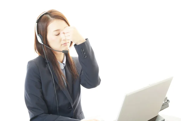 Trött call center operatör — Stockfoto