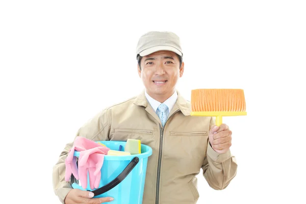 Sorridente asiatico janitor — Foto Stock