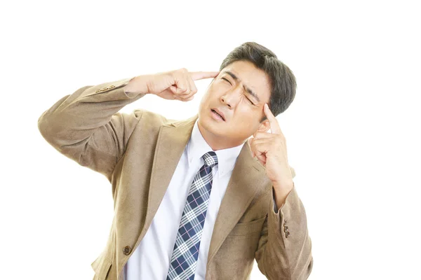 Businessman having a headache — Stock Photo, Image