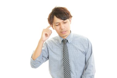 baş ağrısı olan işadamı