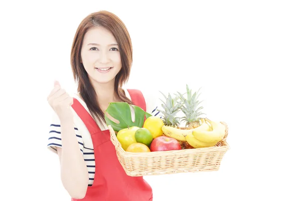 Donna sorridente con frutta . — Foto Stock