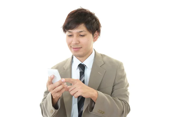 Happy man holding smart phone — Stock Photo, Image