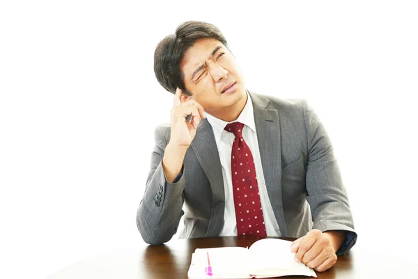 Businessman having a headache — Stock Photo, Image