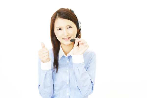 Smiling call center operator — Stock Photo, Image