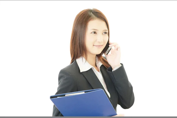 Mujer de negocios con un teléfono inteligente — Foto de Stock