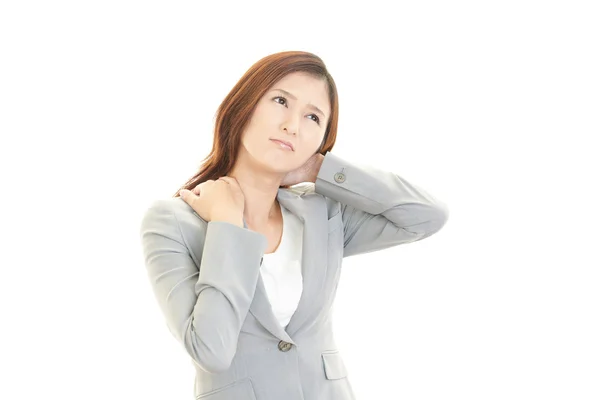 Business woman with shoulder pain. — Stock Photo, Image