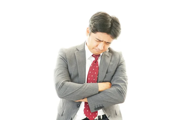 Stressad asiatisk affärsman — Stockfoto