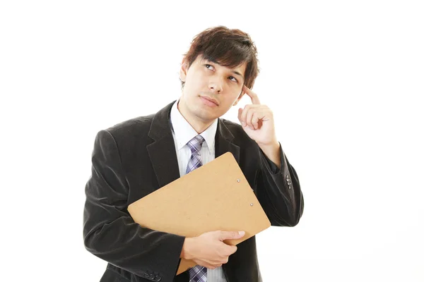 Retrato del hombre de negocios que se ve incómodo. —  Fotos de Stock