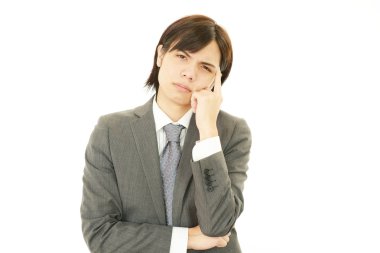 yorgun ve stresli Asya iş adamı