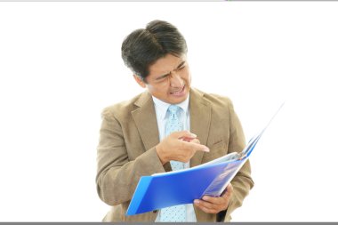 yorgun ve stresli Asya iş adamı