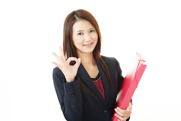 Geschäftsfrau mit ok Handzeichen — Stockfoto