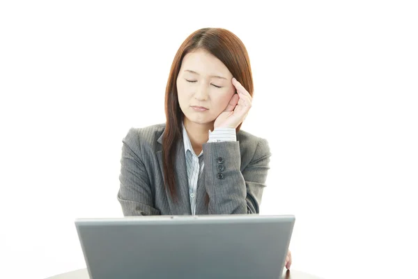 Mujer de negocios con dolor de cabeza —  Fotos de Stock