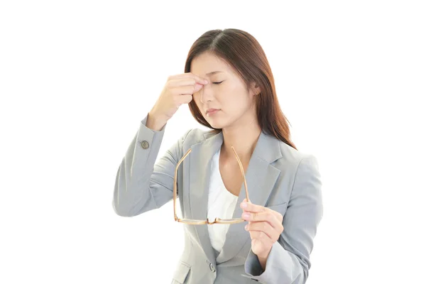 Mujer de negocios joven y cansada — Foto de Stock