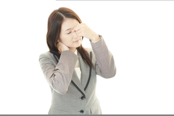 Tired young business woman — Stock Photo, Image