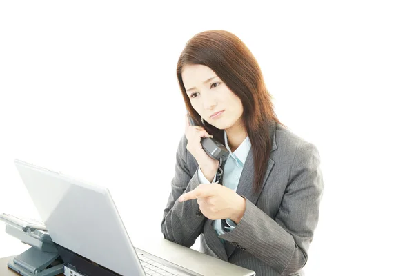 Tired and stressed young business woman — Stock Photo, Image