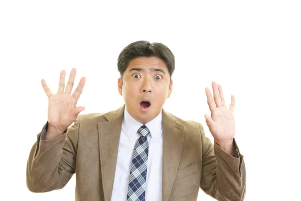Surprised Asian businessman — Stock Photo, Image