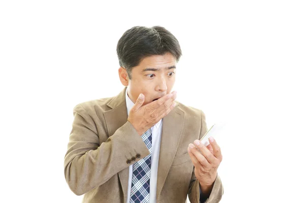 Sorprendido hombre de negocios asiático — Foto de Stock