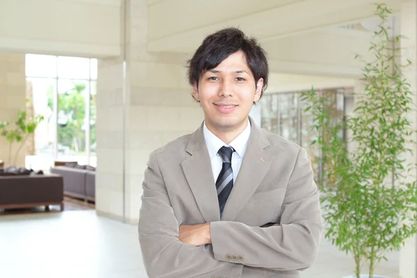 Sorridente uomo d'affari asiatico — Foto Stock