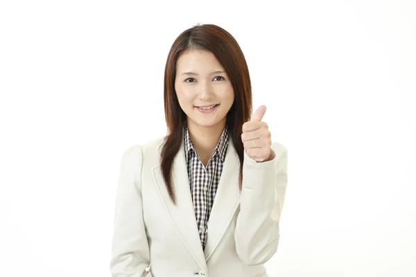 Mujer de negocios sonriente con pulgares arriba —  Fotos de Stock