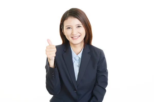 Smiling business woman with thumbs up — Stock Photo, Image