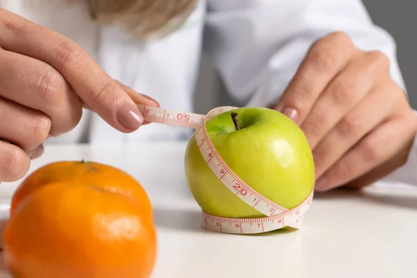 Nutritionist office desk, showing healthy  fruits. Healthcare and diet concept. Lifestyle.