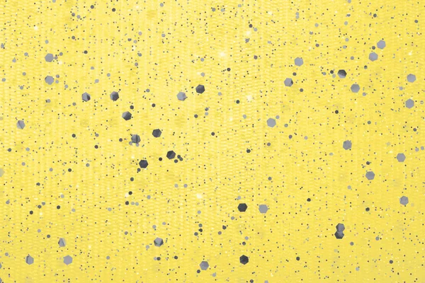 Illuminating yellow background with Ultimate Gray color glitter confetti. — Stock Photo, Image