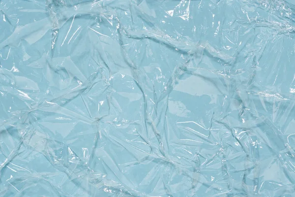 Wrinkled cling film, blue vinyl art background, wet effect texture. — Stock Photo, Image