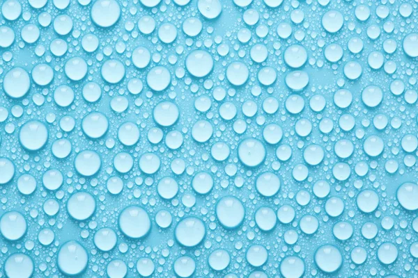 Gotas de agua azul, fondo abstracto o textura. — Foto de Stock