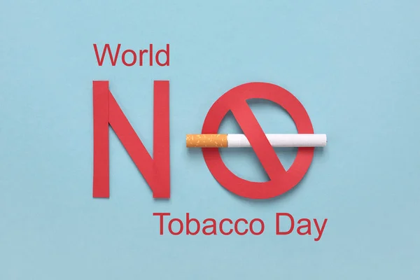 Signo prohibido con un cigarrillo y texto rojo Día Mundial Sin Tabaco. —  Fotos de Stock