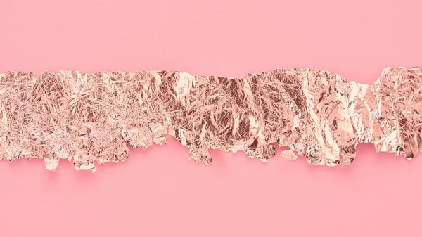Rose gold paper strip torn on pink background, copy space, art design. Stock Photo