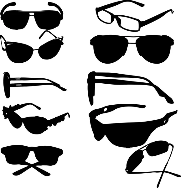 Silhuetas de óculos de sol em um fundo cinza — Fotografia de Stock