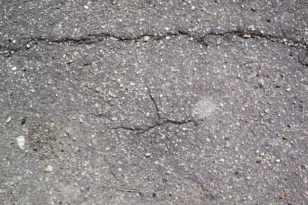 Textura de asfalto con grietas — Foto de Stock