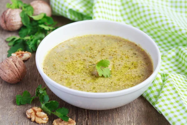 Traditional soup kharcho of beef broth with walnuts, cilantro an — Stock Image Traditional soup kharcho of beef broth with walnuts, cilantro an Royalty Free Stock Photos