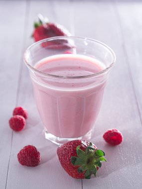 Strawberries with milk clipart
