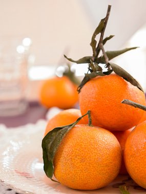 Mandarins on a plate clipart