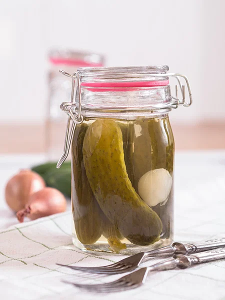 Marinated cucumbers in a glass — Stock Photo, Image