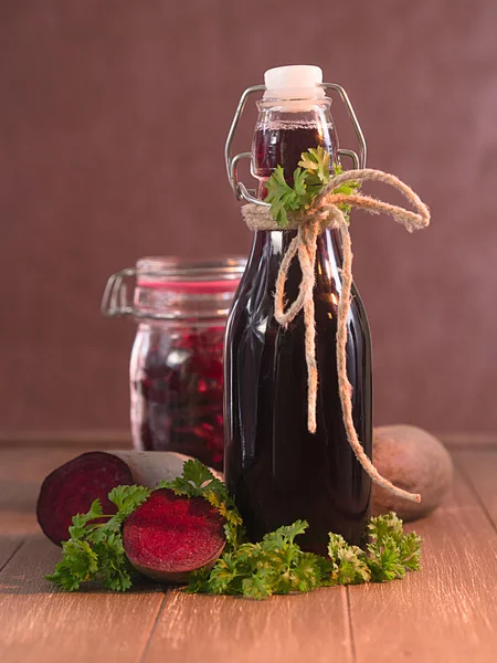Beetroot in the glass and beetroot juice in a bottle — Stock Photo, Image