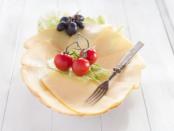 Cheese on a plate — Stock Photo, Image