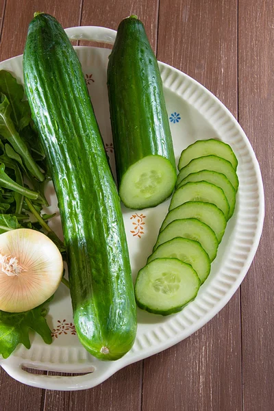 Cucumbers on a plate — Stock Photo, Image