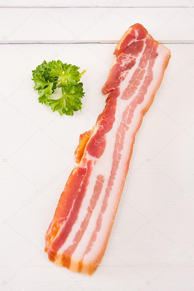 Bacon with parsley as a decoration