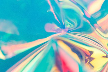 Dikkati dağılmış. Soyut yanardöner holografik mavi portakal sıvısı arka plan yansımaları, ışık saçan yumuşak odaklı. Tebrik kartı ya da blog için moda renkleri şenlik arka planı. Boşluğu kopyala