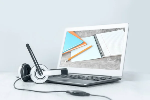 Laptop Screen Notebooks Headphones White Desk Blue Background Banner Distant — Stock Photo, Image