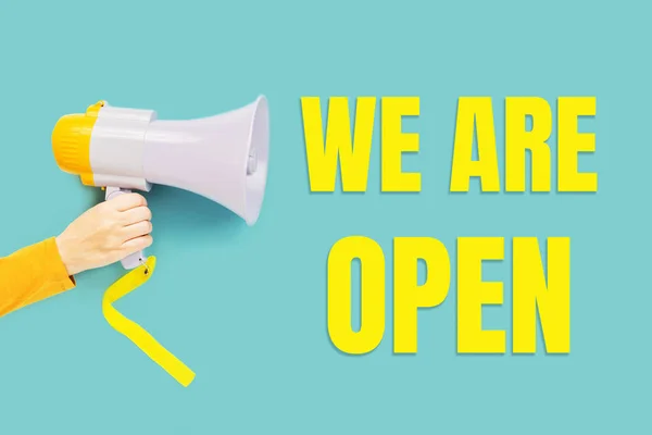 Open Yellow Bright Text Megaphone Hand Back Normal Opening Hours — Stock Photo, Image