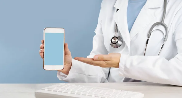 Cropped View Female Doctor Pointing Smartphone Medical App Blank Blue — Stock Photo, Image